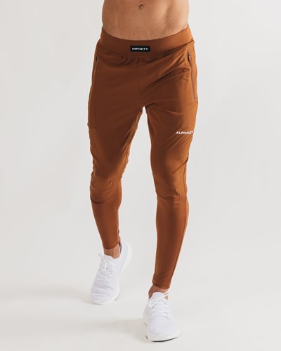 Alphalete Woven 4-Way Stretch 29" Pant Spice | 21483TZJM