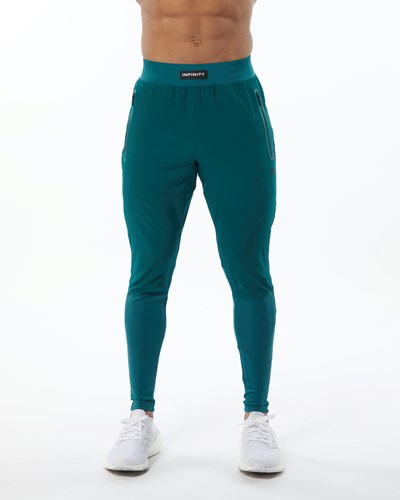 Alphalete Woven 4-Way Stretch 29" Pant Velvet Teal | 41927EPVS