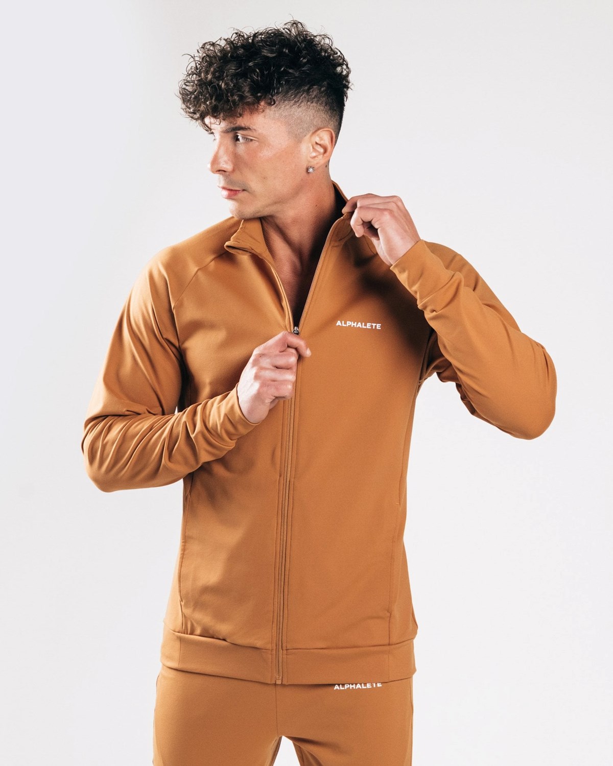 Alphalete 4-Way Stretch Track Jacket Camel | 17265MNRP