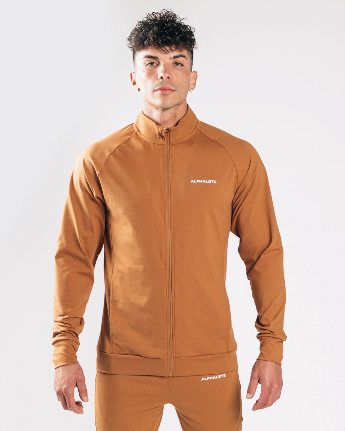 Alphalete 4-Way Stretch Track Jacket Camel | 17265MNRP