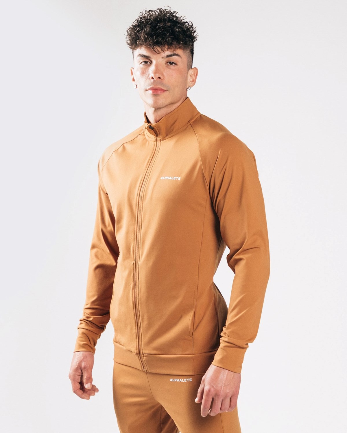 Alphalete 4-Way Stretch Track Jacket Camel | 17265MNRP