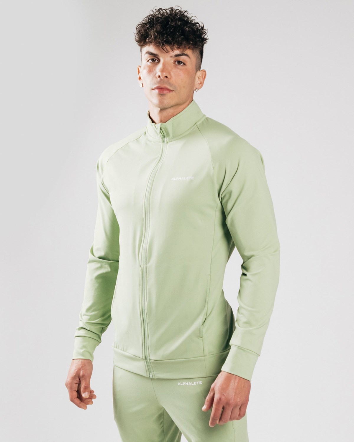 Alphalete 4-Way Stretch Track Jacket Frozen Spring | 78651OQXM