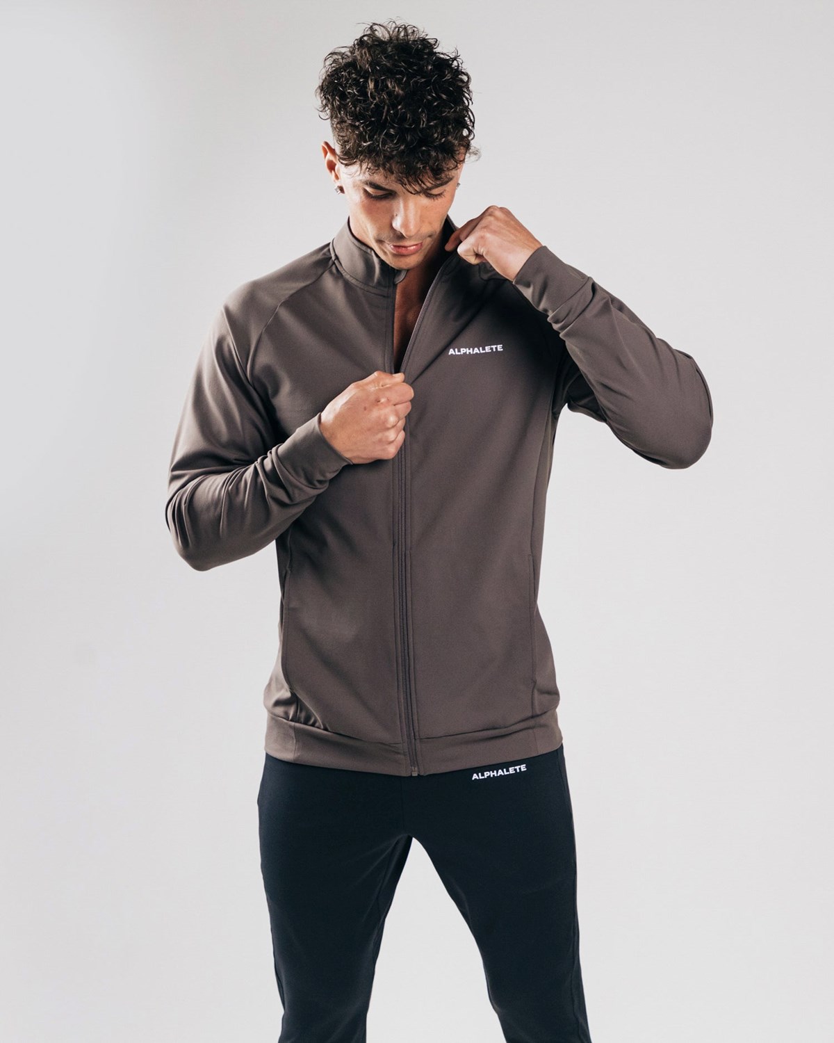 Alphalete 4-Way Stretch Track Jacket Striker | 81972HTBE